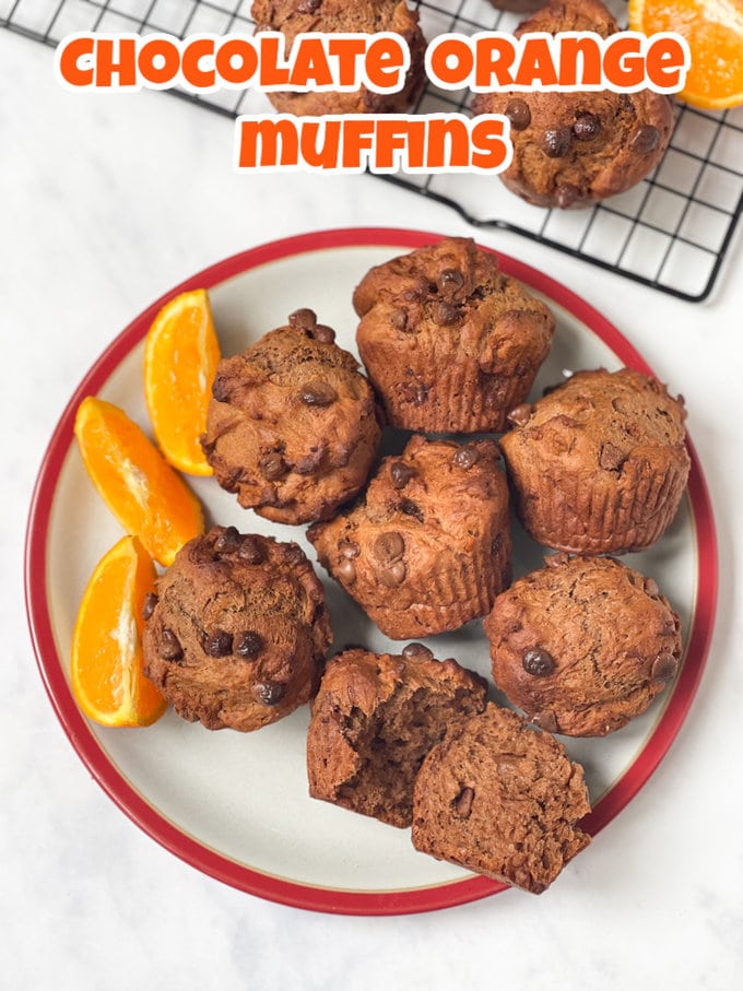 Summer Snacks For Kids- Chocolate Orange Muffins on plate with quarters of oranges
