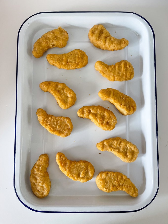 Cooked nuggets in a metal oven dish, ready to be transferred into food flask.