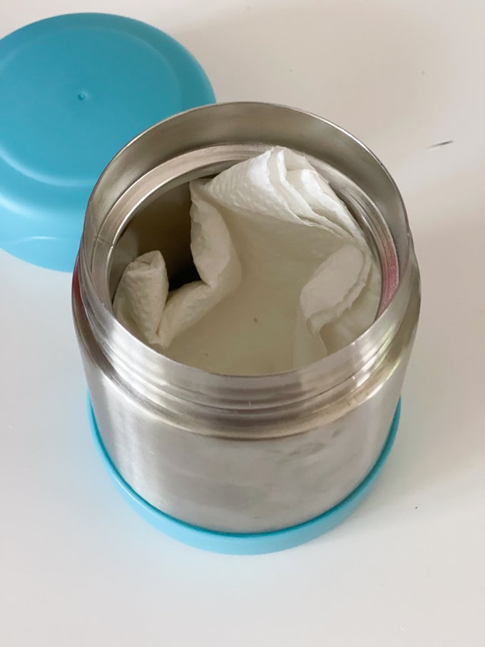 A piece of paper towel has been placed into food flask to remove some of the moisture.