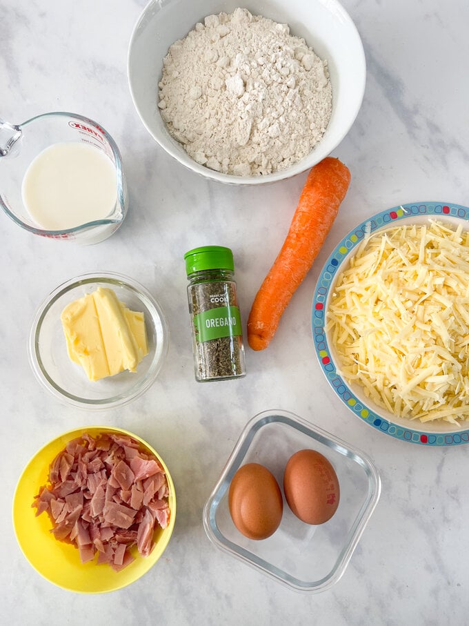 ingredients for the muffins all set out on a worktop in bowls.