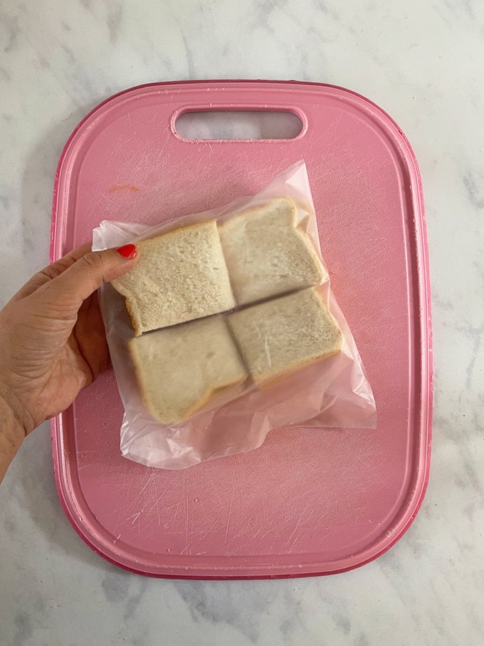 Made sandwiches cut into four and added to a clear sandwich bag ready for freezing.