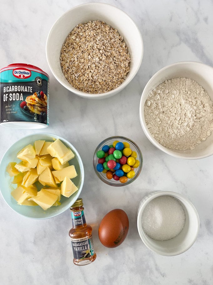 Ingredients arranged on kitchen worktop in small bowls. 