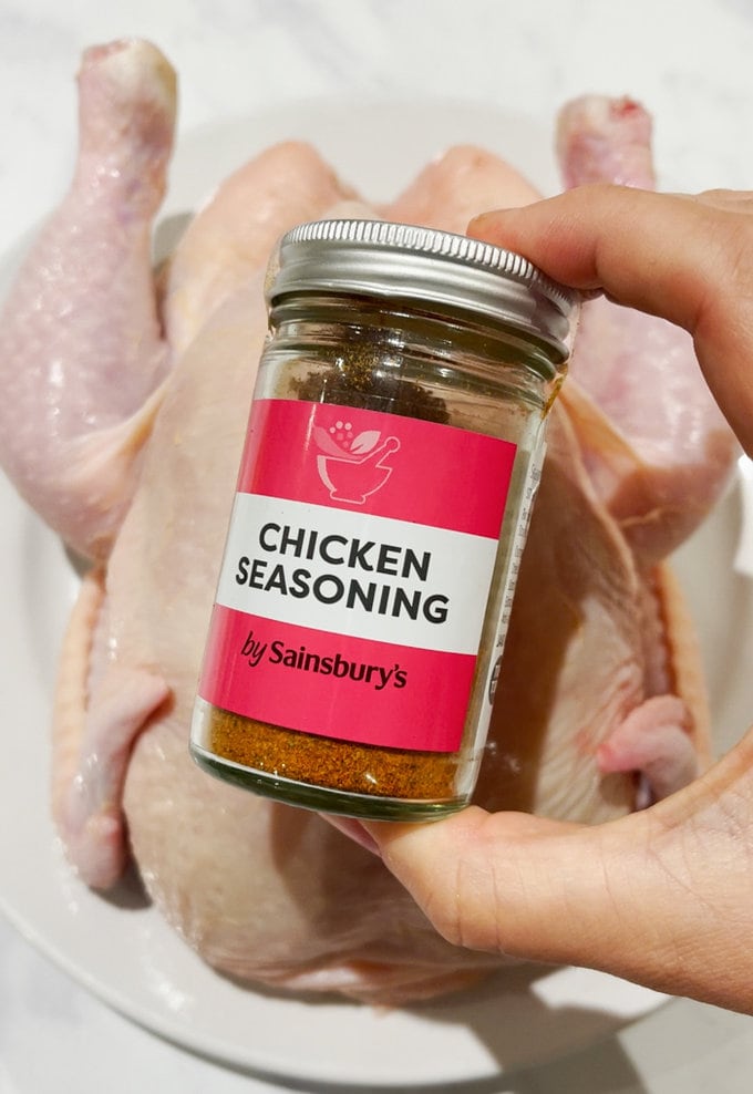 Jar of chicken seasoning used to spread over chicken before cooking.