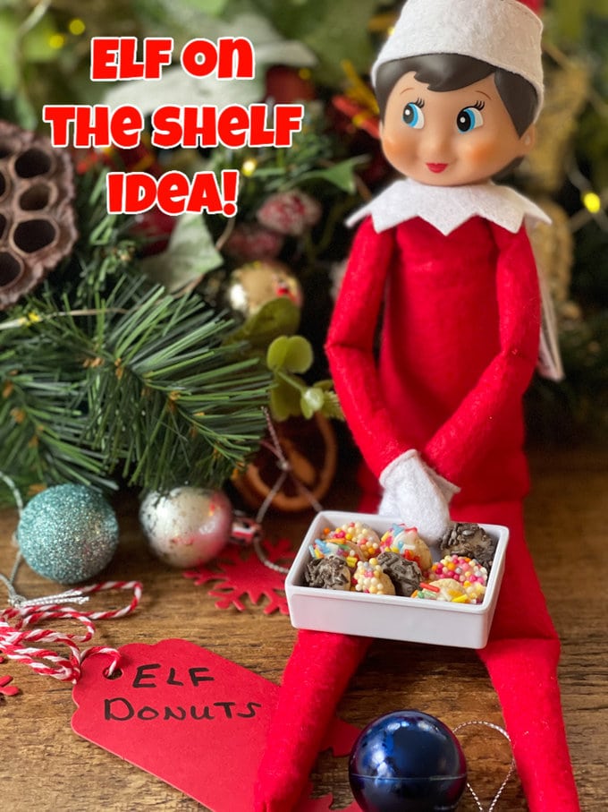 Elfas ant lentynos su mini elfų spurgomis 