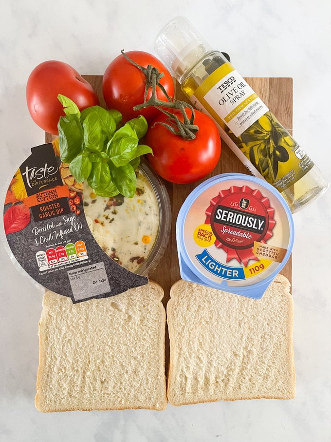 ingredients displayed on a wooden chopping board. 