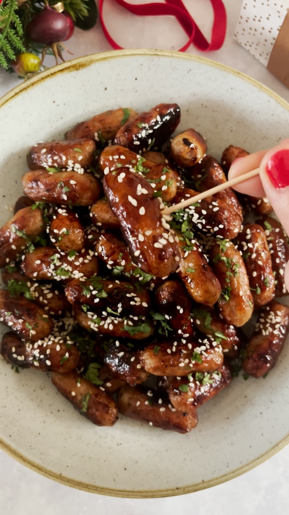 a close up of the cocktail sausages fully garnished