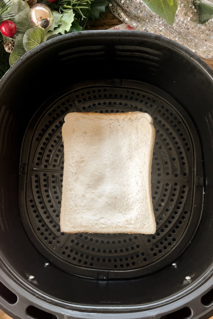 Toastie placed in air fryer to fry.