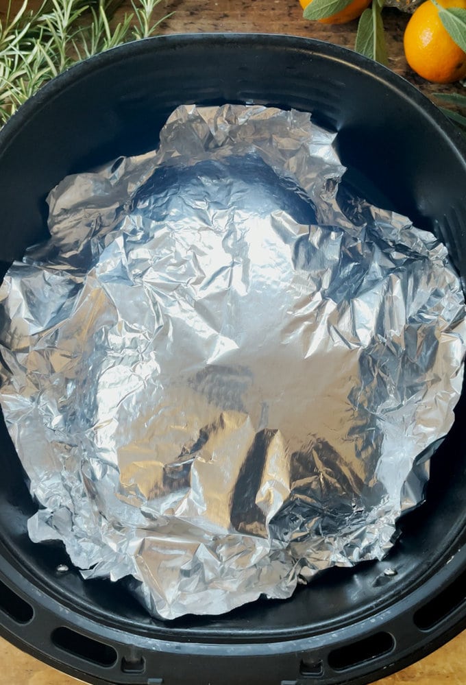 turkey covered in silver foil.