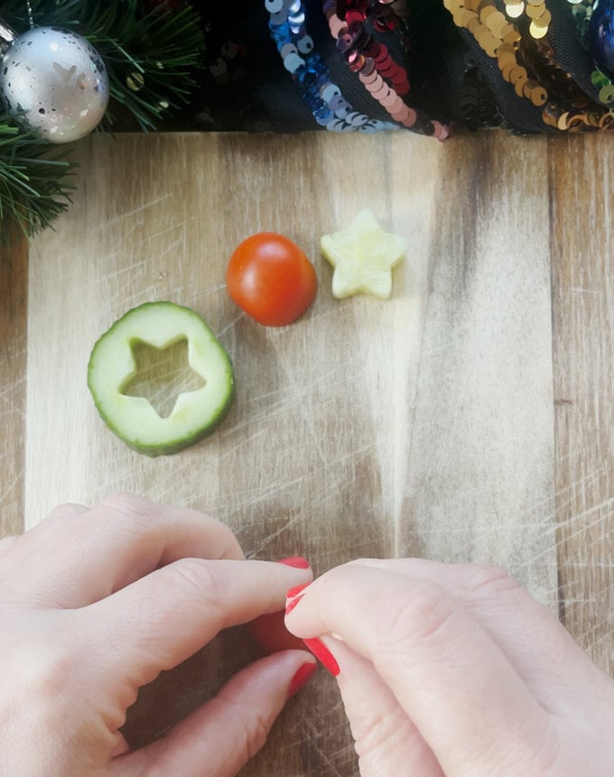 Tree sandwiches being constructed, using a cocktail stick.