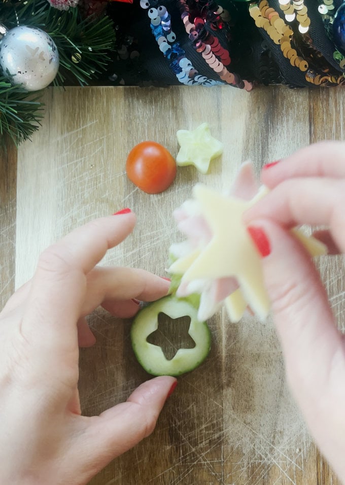 Tree sandwiches being constructed, using a cocktail stick.