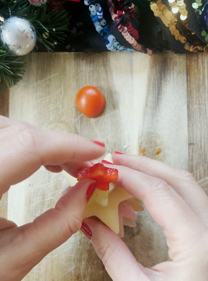 Tree sandwiches being constructed, using a cocktail stick.