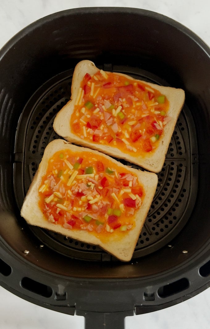 Topping added to bread and placed into the airfryer.