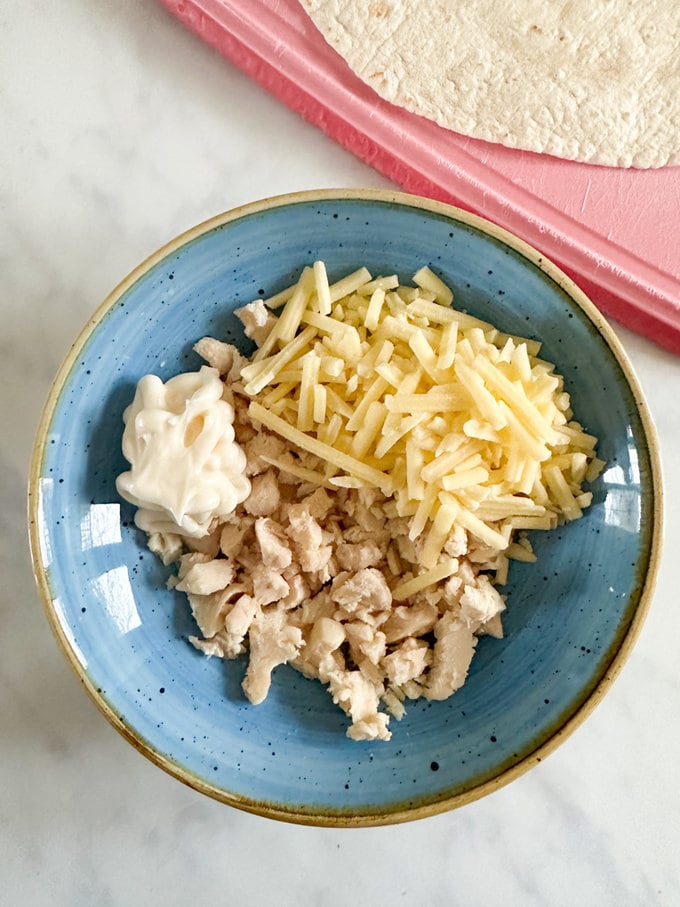 Ingredients all added to a mixing bowl. 