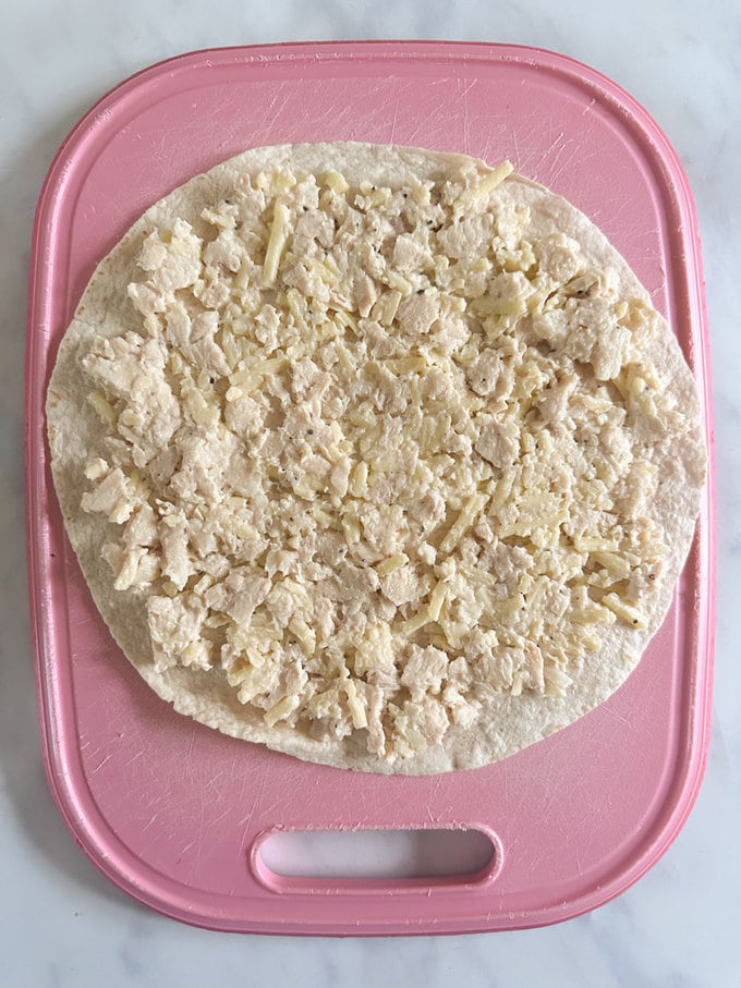 Topping added to tortilla wrap