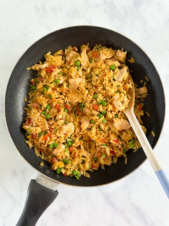 Cooked Paella in a frying pan ready to be served.