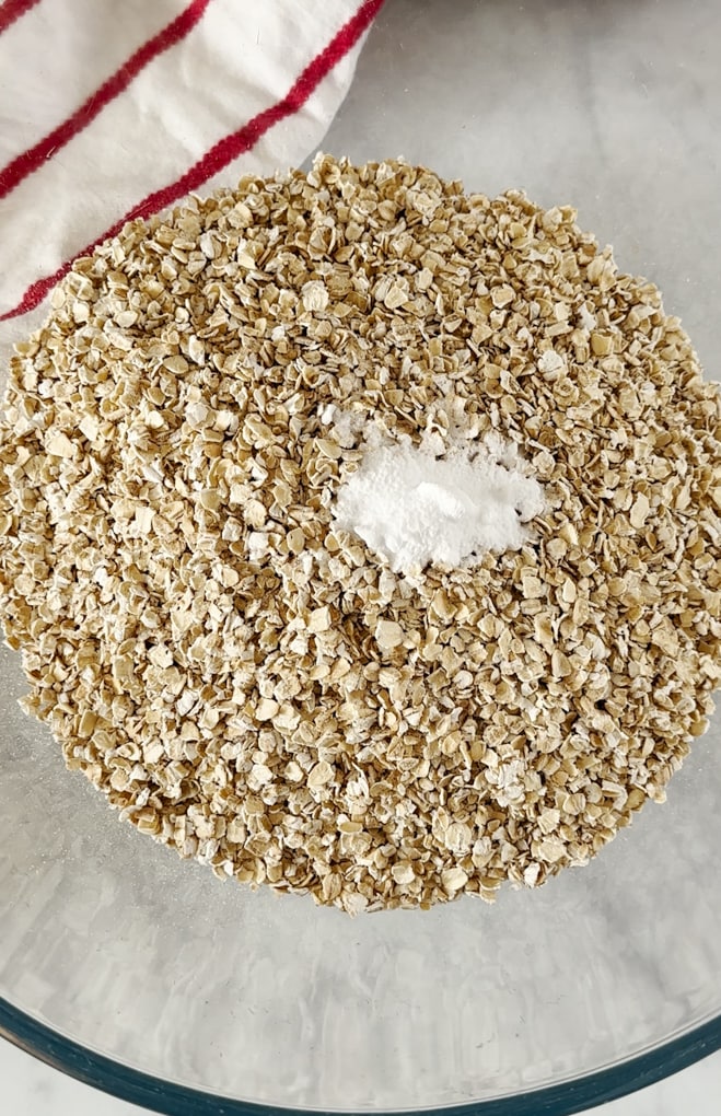 oats, bicarbonate of soda and a pinch of salt in a glass mixing bowl