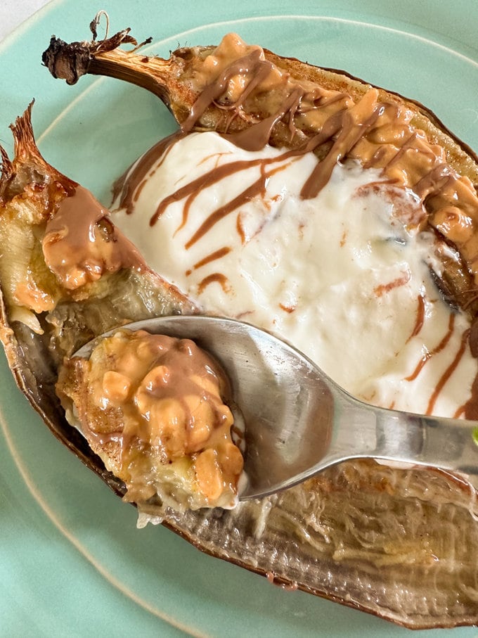 Airfryer snickers banana being eaten using a spoon.