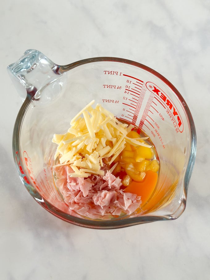 All of the ingredients in a clear glass Pyrex measuring jug.