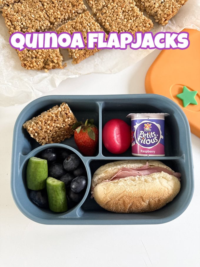one of the quinoa flapjacks packed into a blue silicone bento lunchbox 