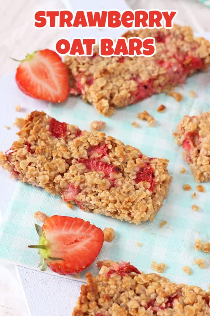 strawberry oat bars with fresh strawberries.