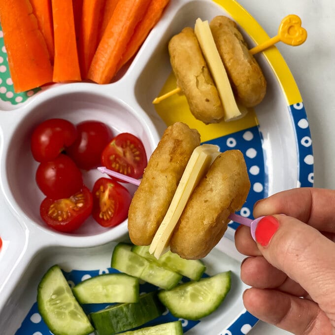 Cheese and Chicken Nuggets on Pastel Pick Sticks from Pick Plates above a Midi Pick Plate.