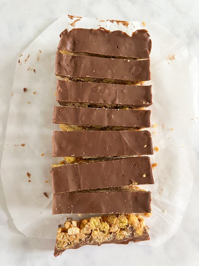 Leftover cereal bar divided into eight bars shaped pieces.