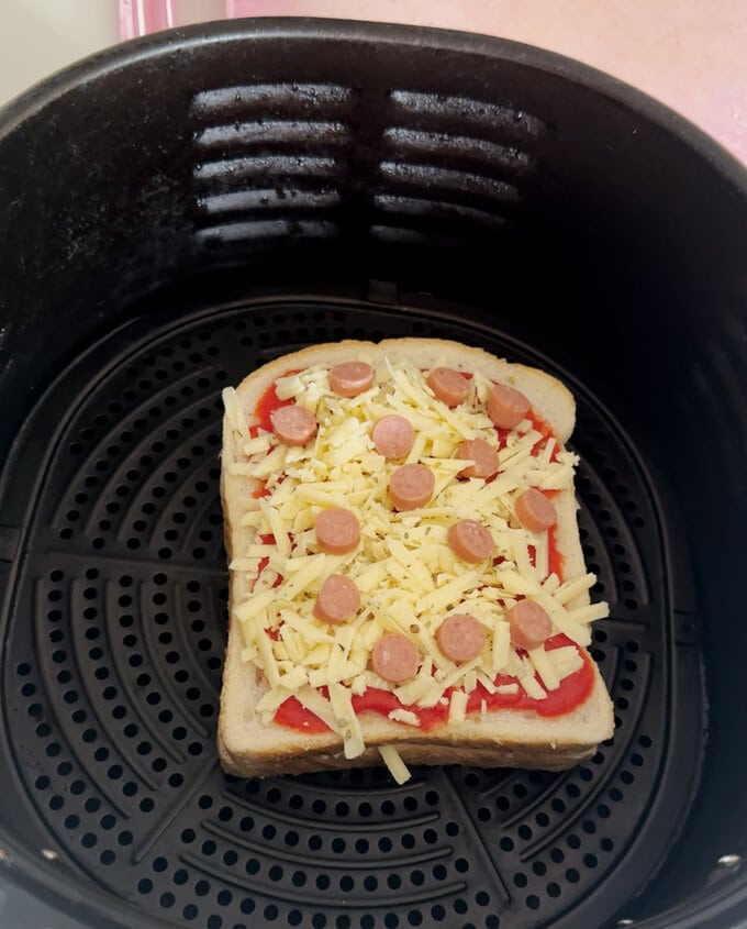 Topped bread added to the airfryer.