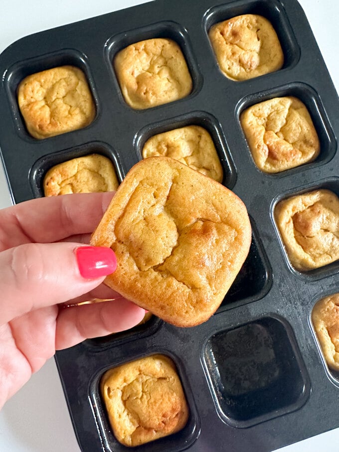 Mini Carrot Banana Bread presented in a square shaped muffin tin.