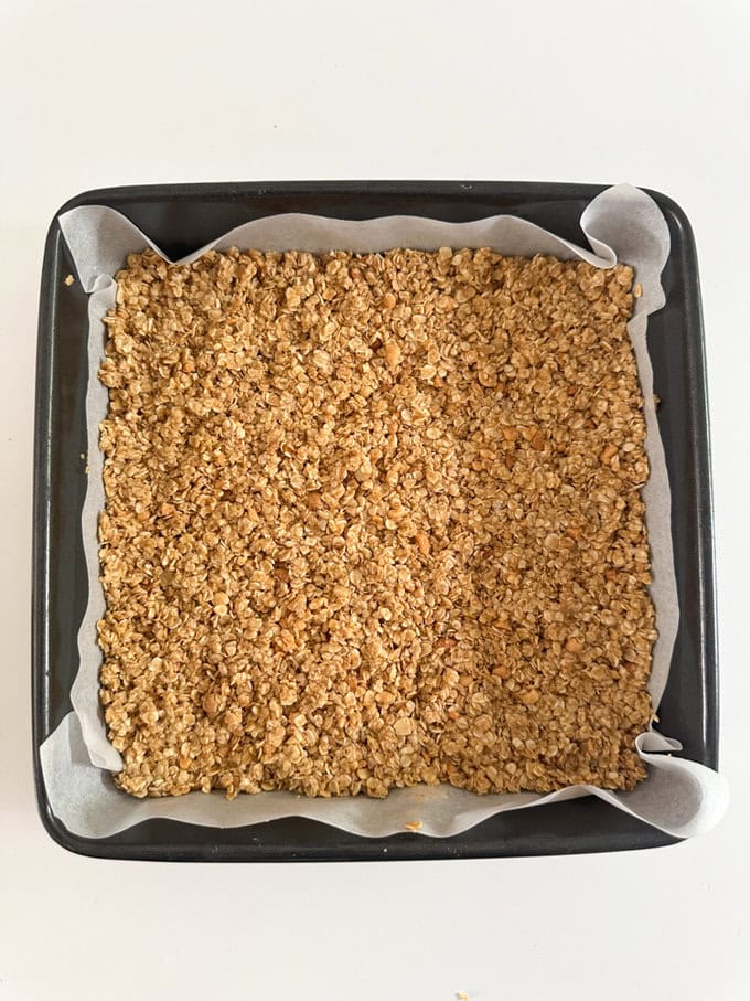 Ingredients added to a deep baking tray.