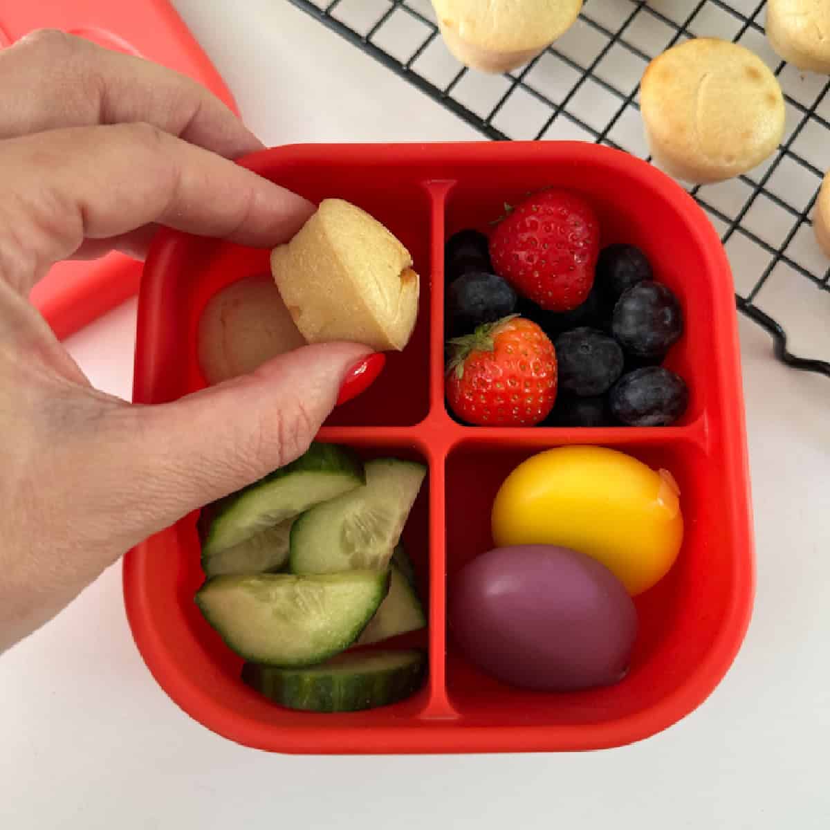 Homemade mini lemon muffins in a snack box