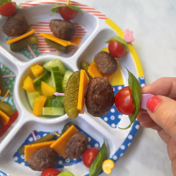Meatball skewers held together with brightly coloured Pick Sticks and served in a Midi Pick Plate.