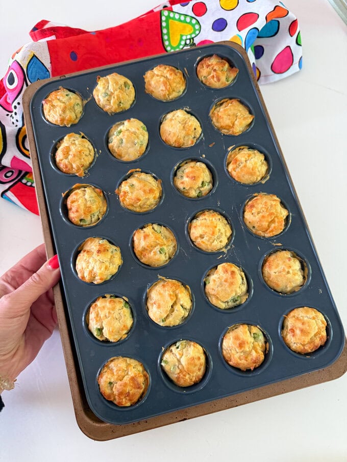 Mini Cheese and Pea muffins fresh out of the oven in there mini muffin tray.