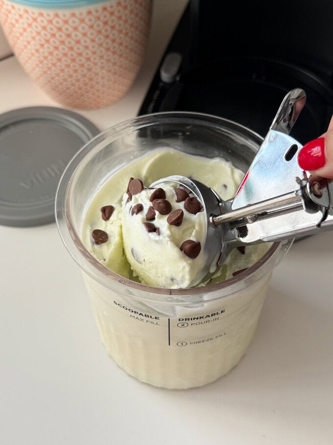 A big ice cream scoop  full of Homemade Mint Choc Chip Ice Cream made in the Ninja Creami