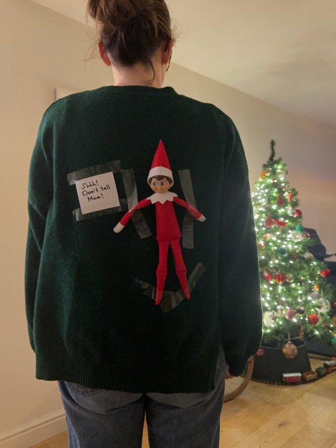Elf & a small note sellotaped to the back of a jumper ready for the kids to notice.