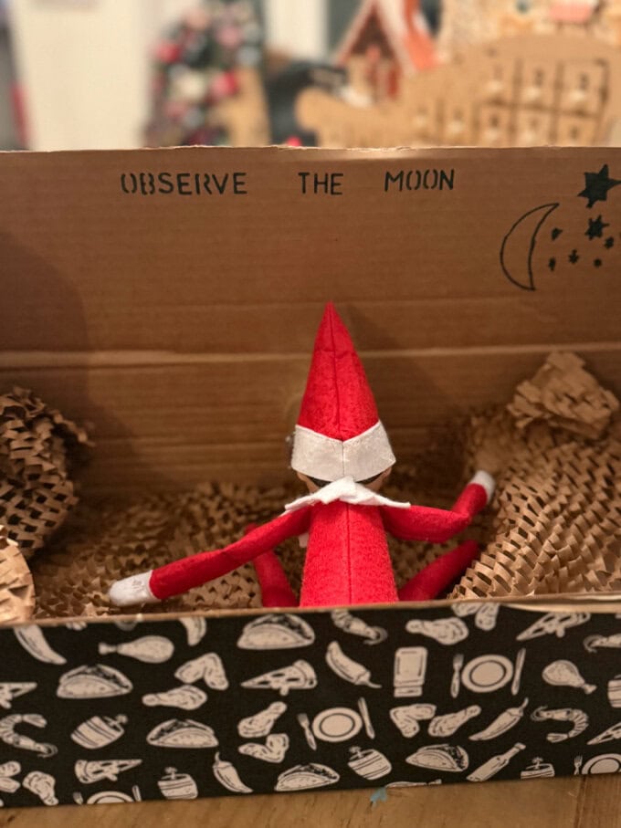 Home » Christmas Recipes » Elf On The Shelf Food Ideas
Published: Dec 9, 2025 · This post may contain affiliate links ·Easy Elf On The Shelf Ideas
Simple and quick Elf on the Shelf ideas that you can use. Perfect for that last minute panic!A Collage of  Simple and quick Elf on the Shelf ideas that you can use. Perfect for that last minute panic!
After years of dodging the Elf nonsense I finally got suckered in when my son said he was so excited for an Elf to arrive this December. So I've joined the ranks of all you parents desperately trying to put together an idea at 10pm every night when all I want to do is crawl into bed!I'm sharing all my ideas here in case it's helpful to anyone else. These are all ideas using props from around my house. I was determined not to spend any money buying unnecessary bits and pieces, so hopefully you will find these ideas quick and cheap to do.I've also included links to my Instagram videos if that's useful!Swinging From The Christmas Tree
Elf On The Shelf hanging from a red,green & white candy cane on  a red ribbon zipwire in the Christmas tree.Tie a ribbon between the Christmas Tree and another point in your house. Add a candy cane and use sellotape to hang the Elf from the candy cane.Watch The Video HereI Pea'd Myself
Elf On The Shelf lent up against a wooden advent calendar in the shape of a sleigh and other Christmas decorations with lots of peas between the Elf's legs, and written in peas below is I PEA'D MYSELF.Ok quick warning with this one, it wasn't quick. It took me about 30 minutes to do. But if you have someone to help it will be much quicker.I just used frozen peas to line up the letters. The dog ate them the next morning - no waste!Watch The Video HereTrain Hijack
Elf On The Shelf laying on toy train tracks with mouth tapped up and hands tied with white & green string.If you have a train that goes around the bottom of your Christmas Tree, tie up Elf's hands and feet with some string and stick some tape to his mouth then place him on the tracks in front of the train!Watch The Video HereI Made Crisps!
Elf sitting on a grater next to a potato with a face drawn on a potato .Then some crisps added  underneath on a Christmas plate.
Draw a face on a potato and stick it into a cheese grater. You might find it easier to do this by cutting a small slice off the back of the potato.Then add some crisps underneath.Watch The Video HereFunny Face Photograph
Elf hanging on photo frame with a black sharpie in hand, having just drawn funny faces on the family photo.
Use a sharpie to draw funny faces onto the glass frame of a family photo.You might want to do a small test of this first to make sure it does come off. I wiped it with a little cleaning spray the following day and that did the job for me!Watch The Video Here6-7!
Elf in a child's colorful Christmas stocking hold a uno number 6 in one hand and a 7 in the other.
I'm so tired of hearing this on repeat in my house but decided to use it to my advantage and do a 6-7 themed Elf idea!I put the Elf into a stocking and sellotaped Uno cards to his hands.Watch The Video HereBroken TV
Elf hanging by one leg from TV screen that looks like it is smashed.This was an emergency Elf idea when I forgot to do it the night before! Search on You Tube for "broken screen" and it will play a video that looks like the tv screen is cracked.Then sellotape the Elf's leg to the back of the tv so it looks like he has crashed into it.Watch The Video HereElf Poop
Elf On The Shelf sitting on a toilet roll pooping out chocolate chips.Another super easy idea. You just need some toilet roll and chocolate chips so it looks like the Elf has pooped!Watch The Video HereRobot Vacuum Reindeer Ride
Elf stood upright on a robot hoover decorated like a reindeer.I searched around the house for anything to turn the robot hoover into a reindeer. I found some reindeer antlers, plastic eyes and used a small decoration for the nose.I glued the eyes and nose to the vacuum and inserted the antlers into the holes underneath the lid. Then propped the Elf up.Watch The Video HereWhere's The Elf?
Elf & a small note sellotaped to the back of a jumper ready for the kids to notice.Sellotape the Elf to the back of your jumper along with a note saying "Shhh... don't tell Mum!"The kids will find it hilarious as you are manically searching for the Elf in the morning!Watch The Video HereHome Alone Elf
Elf sat against a wooden advent calendar, with a cut out of Kevin from home alone stuck over the elf's face, with a note beside saying keep the change ya flithy animal, with a few coins underneath.This is an easy one for any Home Alone fans. I printed out the iconic image of Kevin holding his face in his hands. And also printed the words "Keep The Change Ya Filthy Animal".Sellotape Kevin onto the Elf's face and leave some loose change beside the sign.Watch The Video HereBooby TrapA one to make the kids giggle! Tape a bra or sports bra to a mirror and pop the Elf in.Then write "Booby Trap" on the mirror with lipstick.Watch the Video HereElf in BlenderPop the Elf in the blender with a "Help" sign. But top tip... take the blade out first. You don't want to damage the Elf and the kids might quickly stick their hand in there and get cut. So take it out please!!Watch The Video HereObserve The MoonI can't take credit for this one as my friend saw the idea and made it for me.... gave me a night off Elf duties and I was very grateful!Use a box with a divided piece of cardboard in the centre. Place an empty toilet roll through a hole in the middle. One Elf observing and another Elf (or a toy) baring his butt!