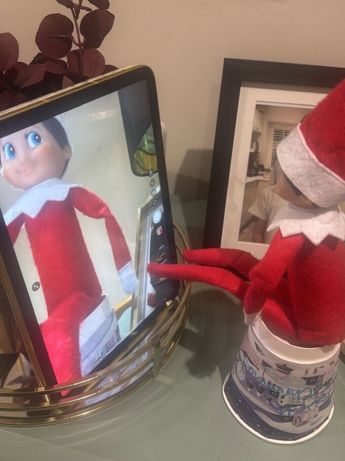 A super quick one you can do in the morning if you have forgotten to move the Elf the night before!Prop him up in front of an ipad and taken some selfies!