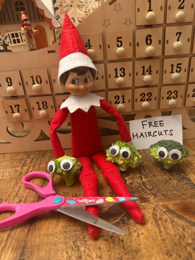 A simple idea which will hopefully make the kids laugh.Just cut the top off some small florets of broccoli. You can pop on some plastic eyes if you have them. Then prop the elf up with his bald broccoli friends and a sign saying "Free Haircuts".Just be careful with young kids and the scissors if you leave them out too!